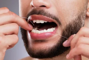 اشتباهات رایج در نخ دندان 3 نخ دندان کشیدن